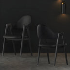 Chaise de salle à manger moderne en cuir à dossier ouvert et incurvé avec accoudoirs