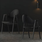Chaise de salle à manger moderne en cuir à dossier ouvert et incurvé avec accoudoirs